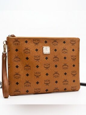 MCM Visetos Wristlet Zip Pouch in MCM’s Classic Cognac Volorway.
